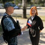 Судебные приставы ДНР поздравили жителей Республики с Днём Государственного флага России